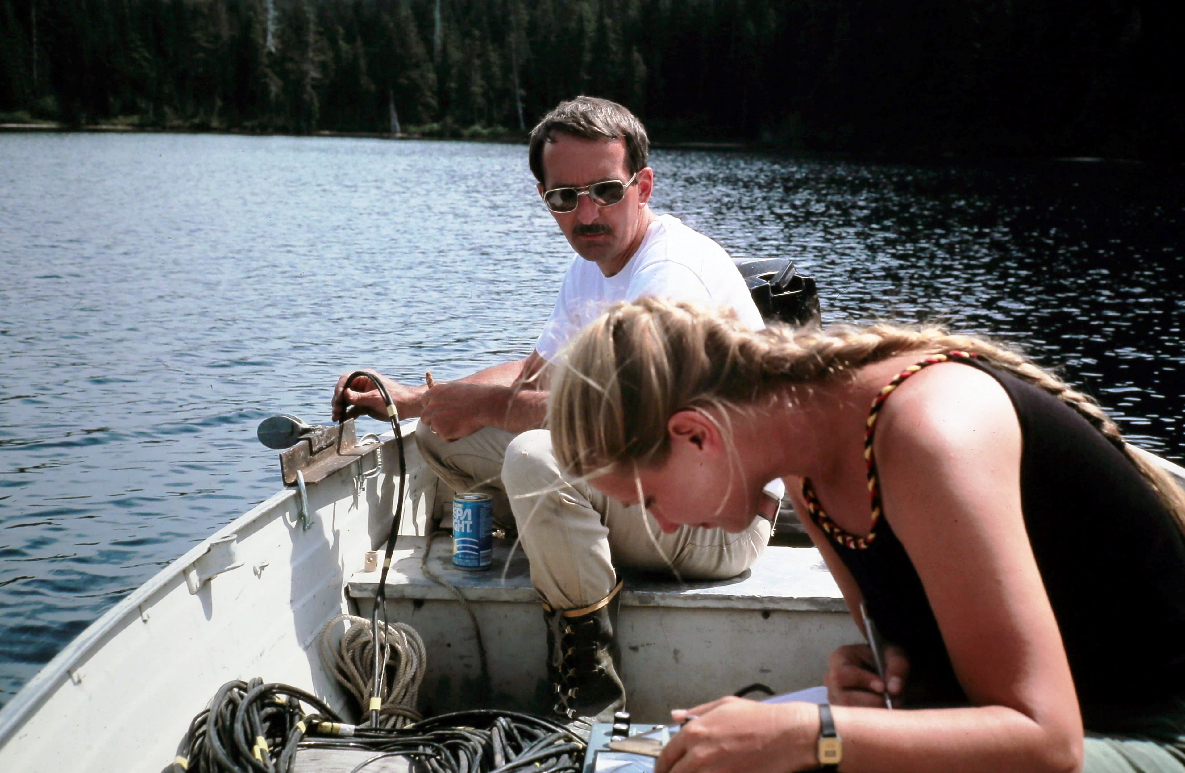 July 20, 1982  N.P. Dion and S.S. Embrey reading Dissolved Oxygen levels at Deadmans Lake, 12.7 miles NNE of the vent and just beyond the blast zone. Deadman's served as the control in the lakes study.  USGS S.S. Embrey